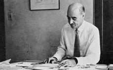 William F. Lamb working at his office